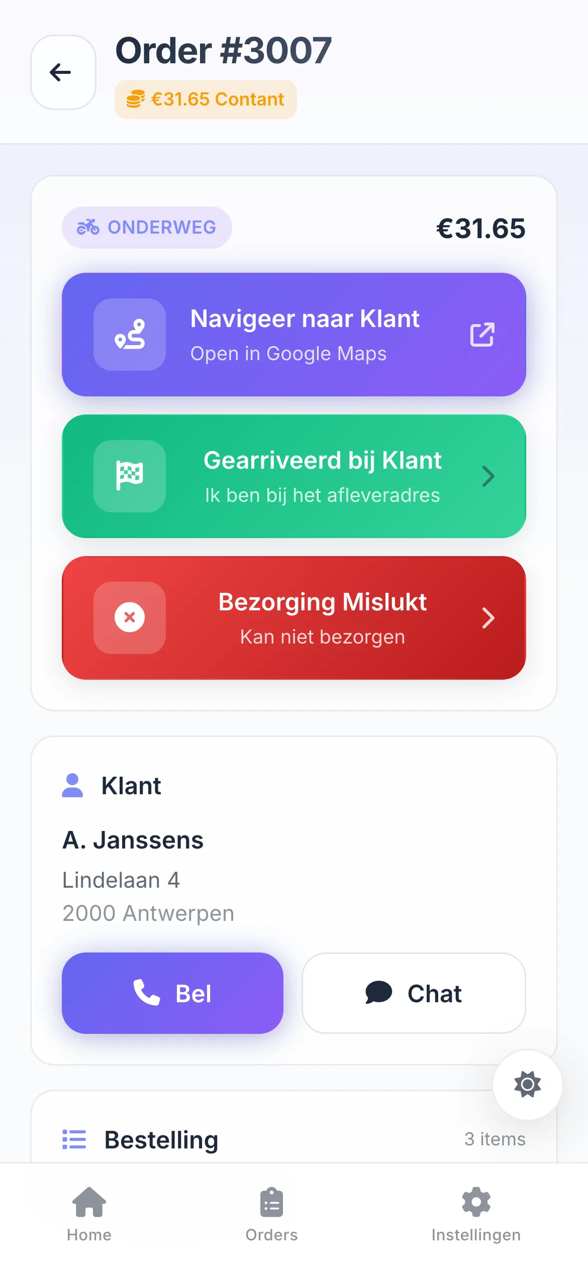 De koerier-app op gsm met het adres en de inhoud van een bezorging.